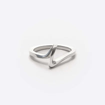 Sera Ring Premium silver twisted knot design ring on white background